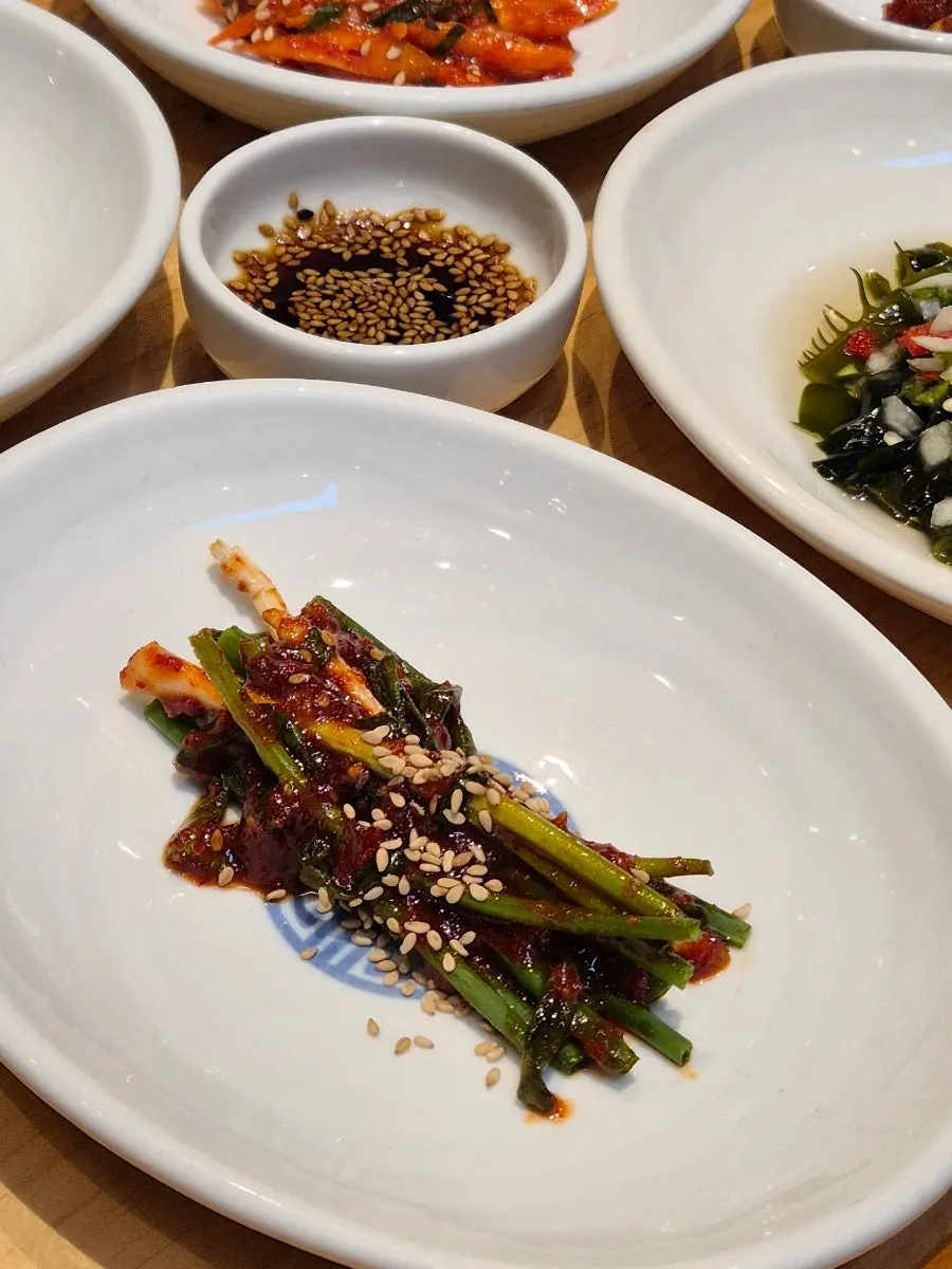 Japchae and lotus root salad among Geumdeungeo's banchan