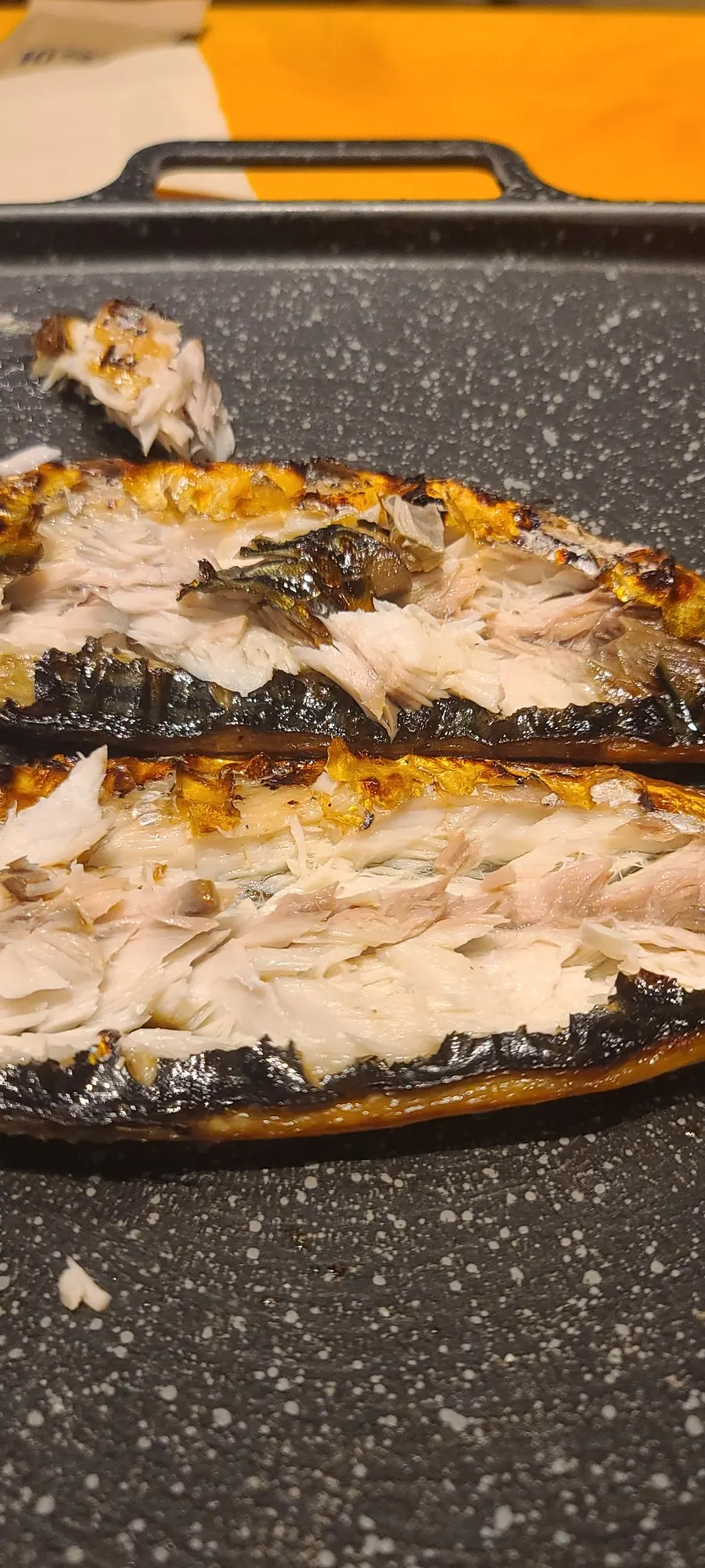 A piece of mackerel dipped in nuruk salt