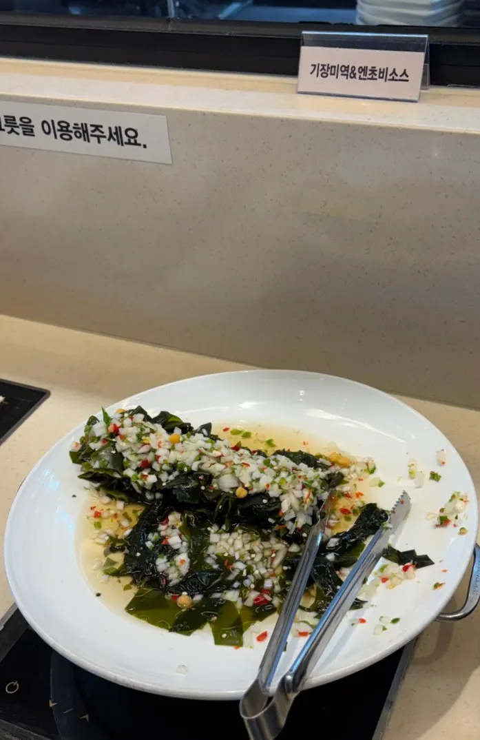 Black sesame lotus root salad at Geumdeungeo's self-service bar