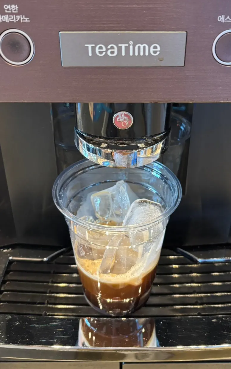 Takeout ice cups and apricot juice dispenser