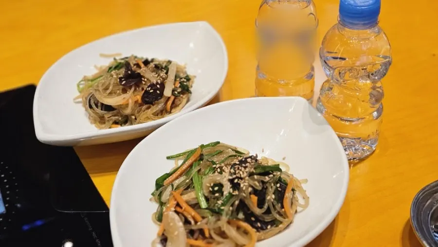 Various side dishes served with rice
