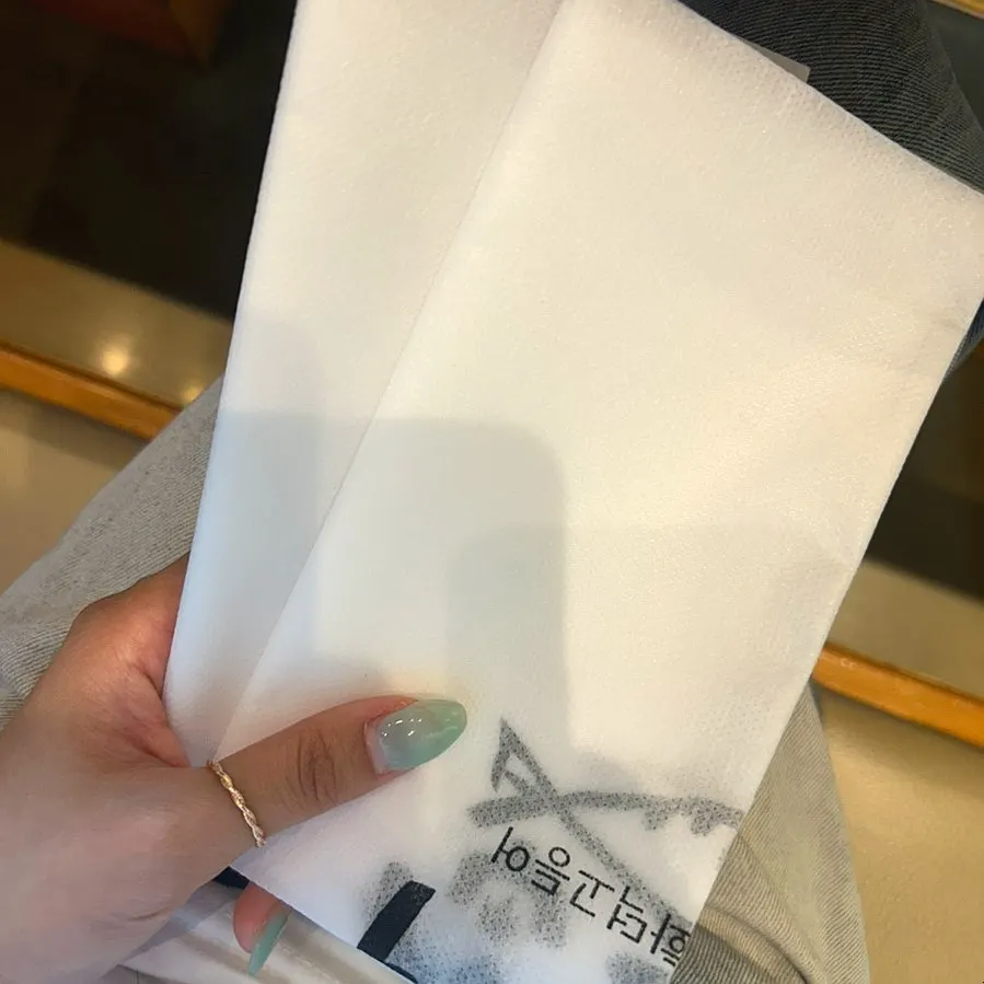 Disposable apron set at the table