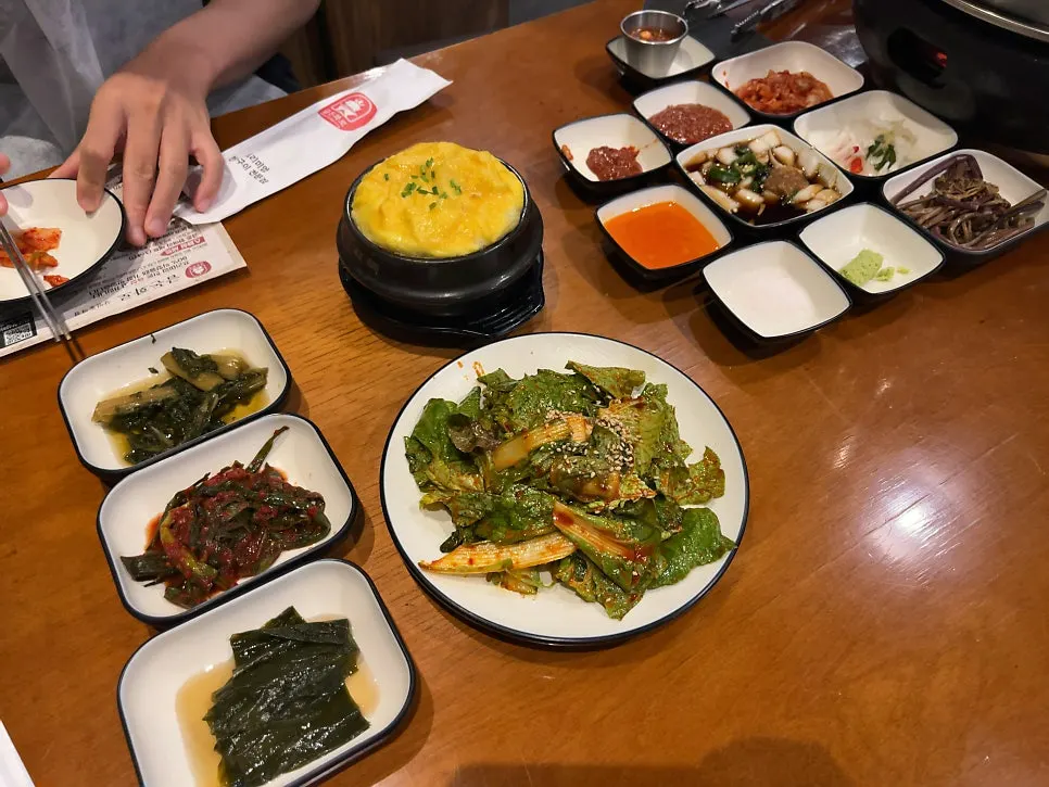 Steamed egg and seasoned vegetables served together