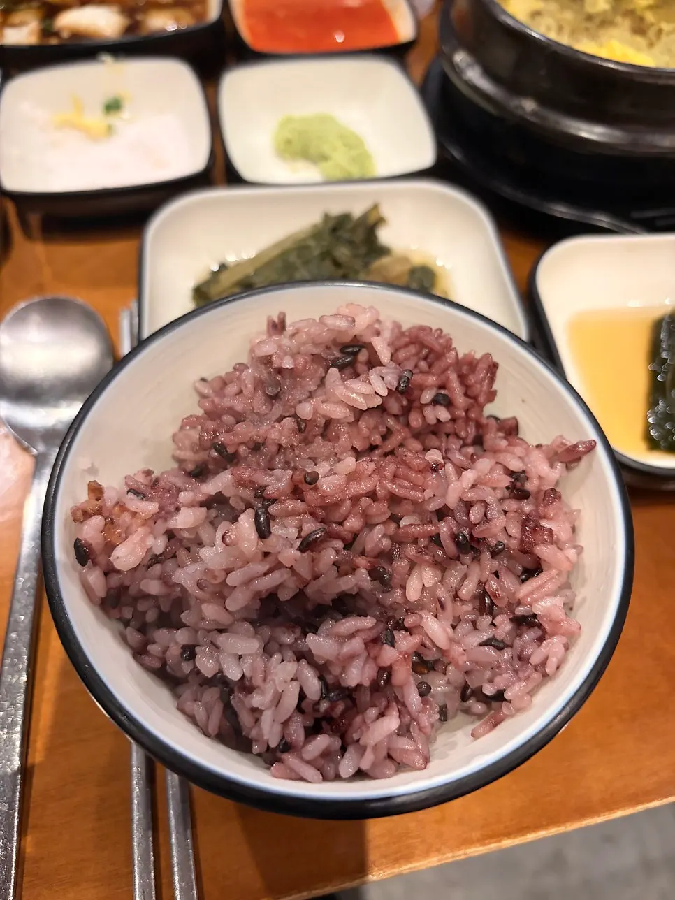 Kimchi jjigae served with a bowl of rice