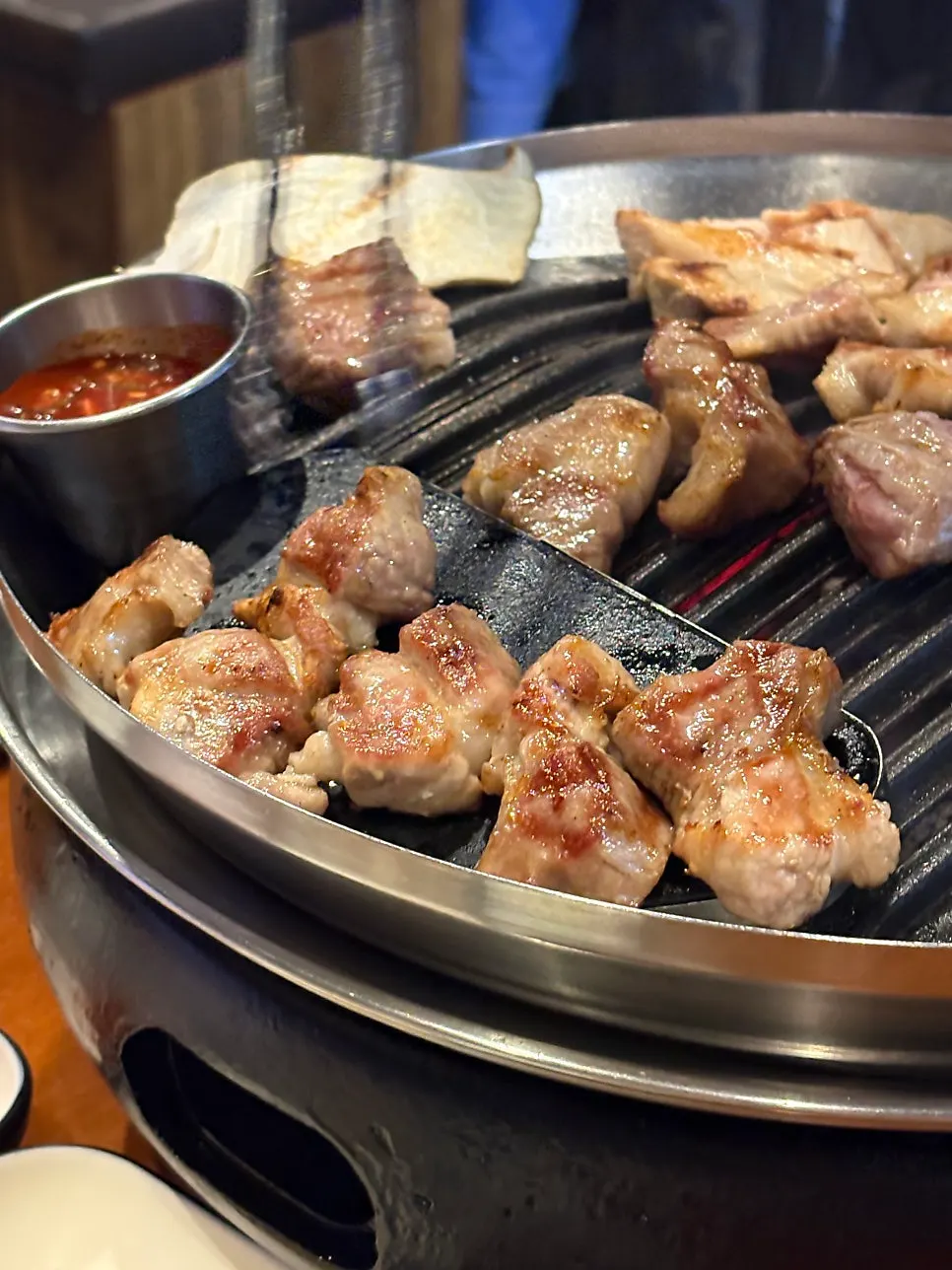 A piece of aged meat dipped in salt