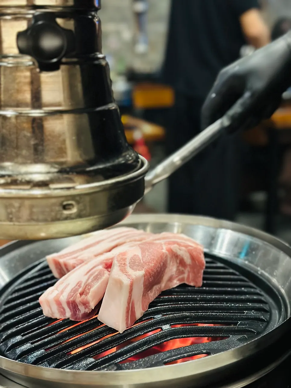 Aged pork belly on the charcoal grill