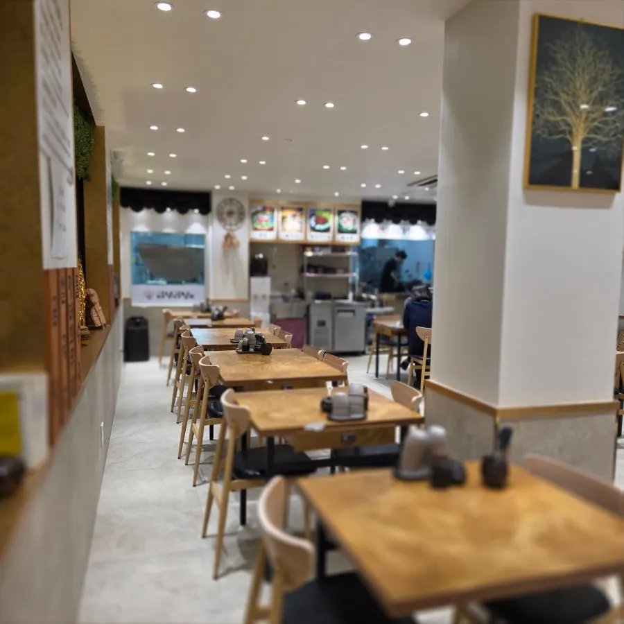Cleanly organized seating inside Geumnyeong Gomtang