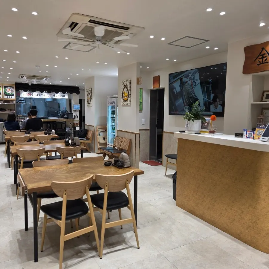 Self-serve banchan corner set up on one side of Geumnyeong Gomtang
