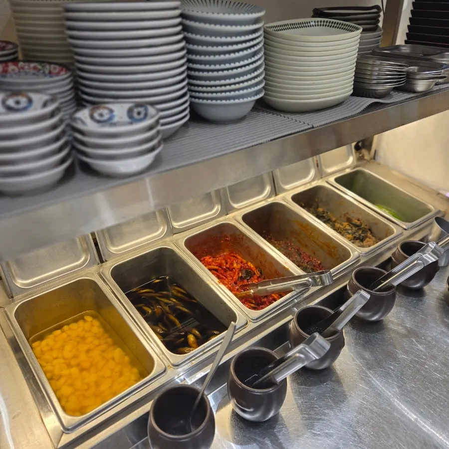 Side dishes laid out at the self-serve bar