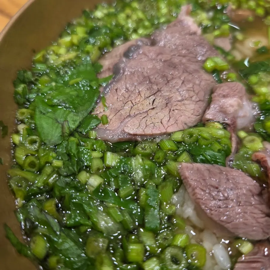 Empty bowl of minari gomtang with the broth finished