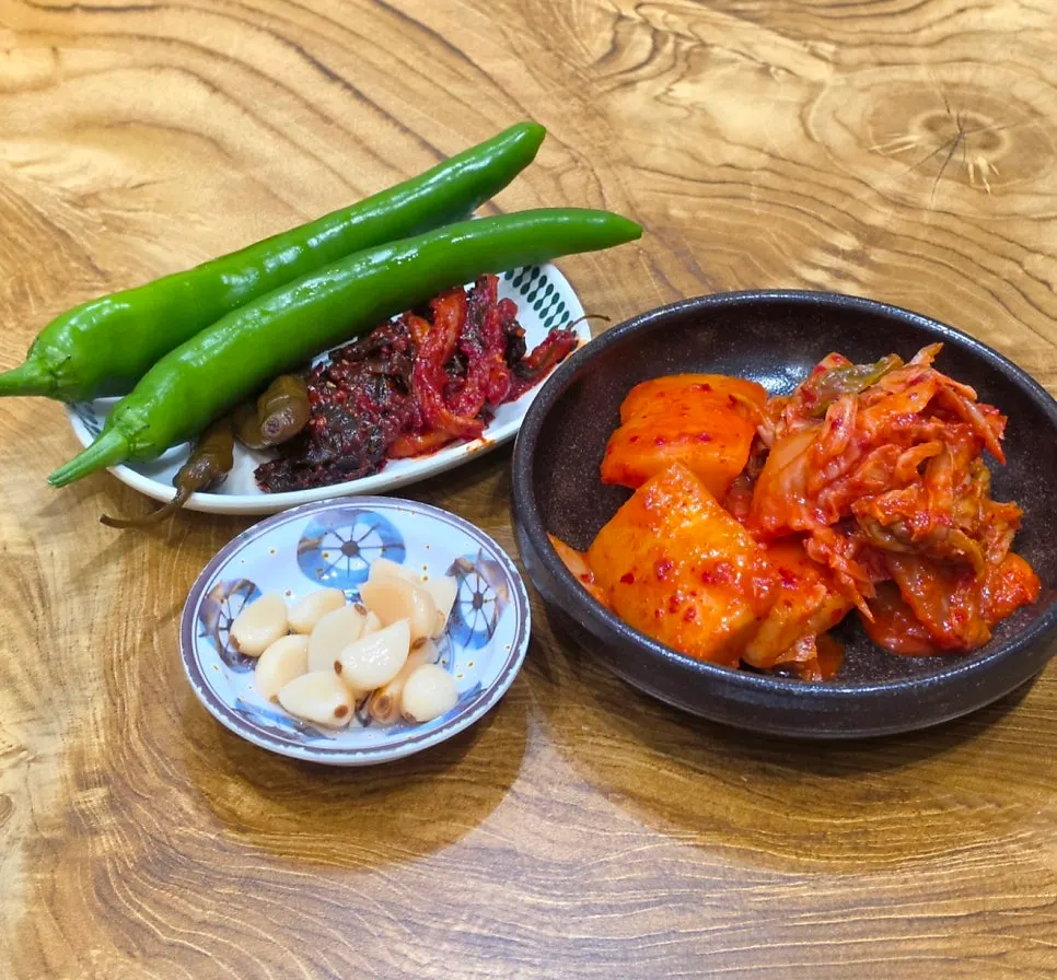 A Korean meal set with gomtang and kimchi together