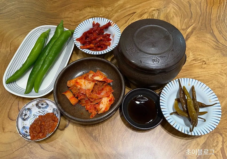 Table set with kimchi and self-bar side dishes