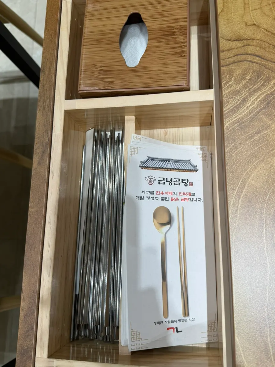 Table setting with a paper chopstick rest