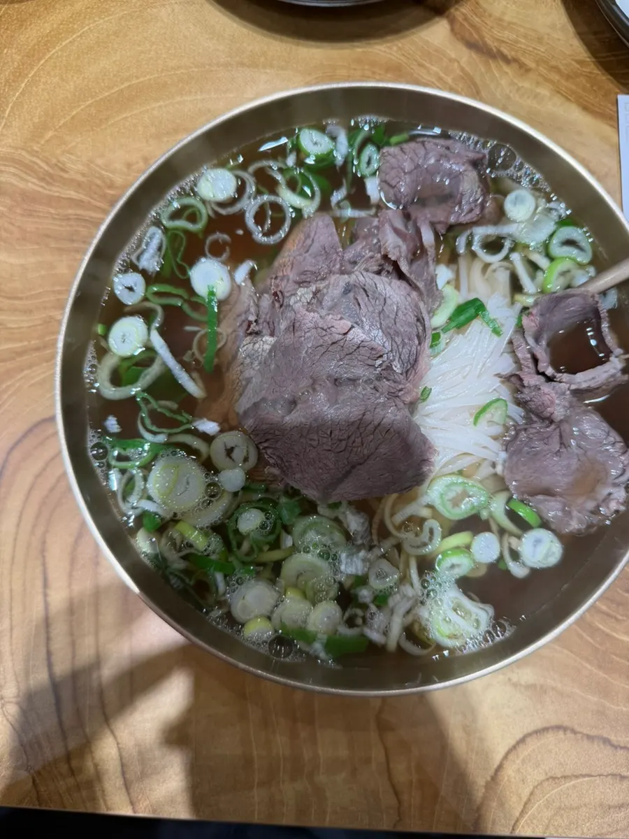 Bowl of rice noodles in gomtang broth