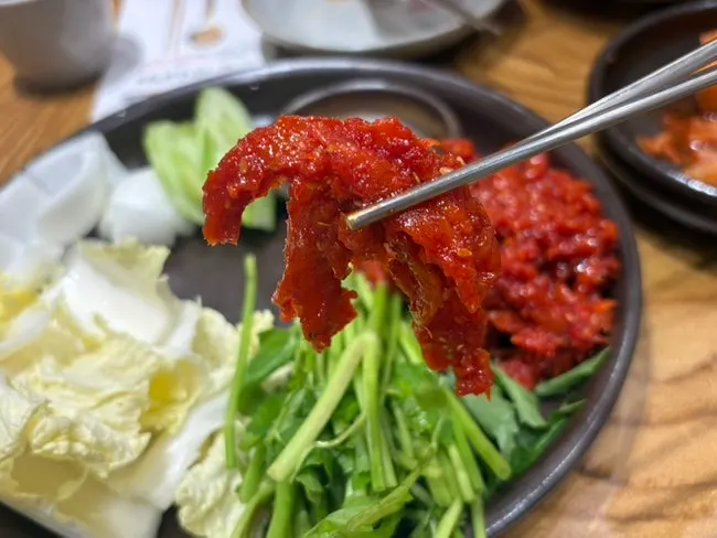 Table set with gomtang and pollock salad together