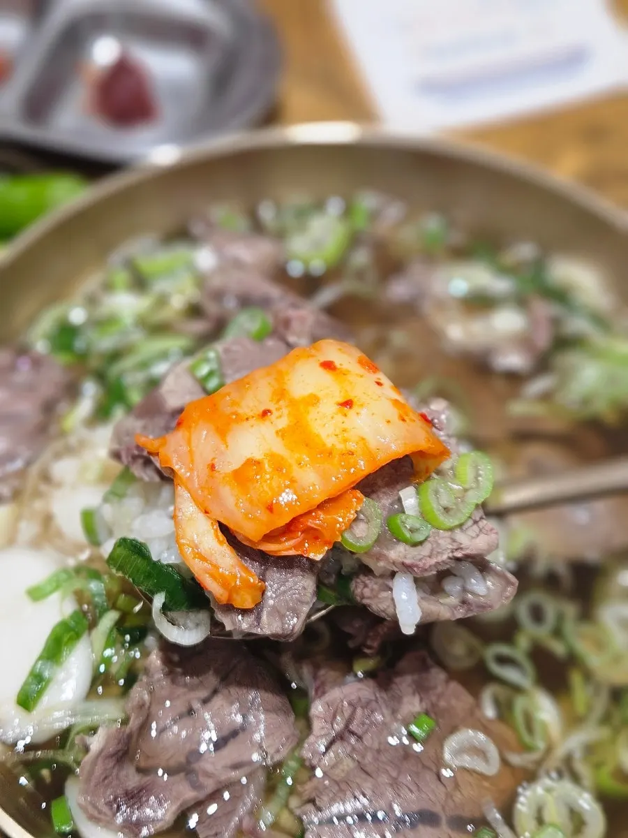Rice and meat mixed into the gomtang broth