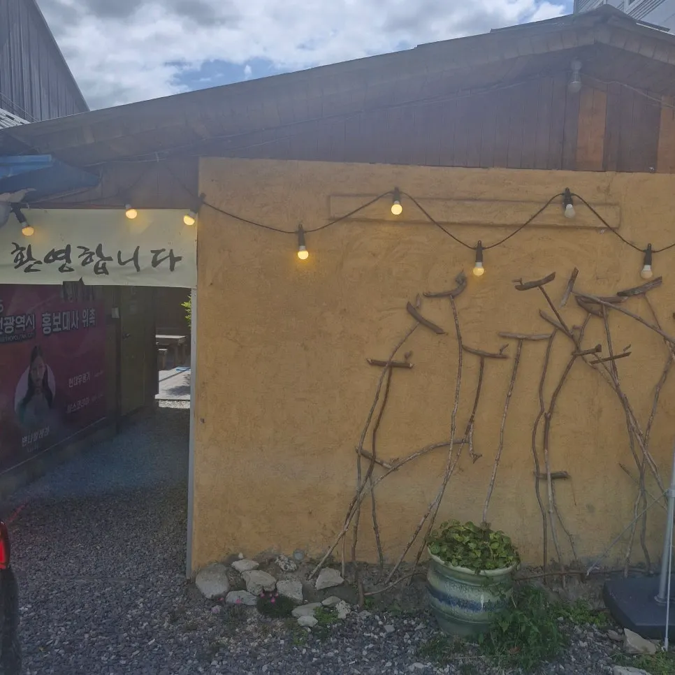 Parking spaces in front of the restaurant and in the vacant lot across the street
