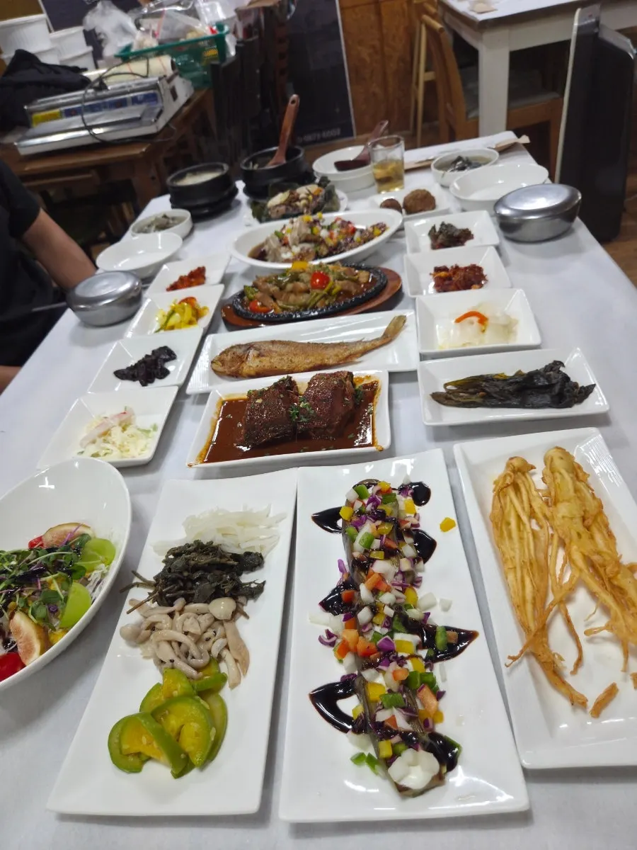 Braised mackerel, crab and other hanjeongsik side dishes
