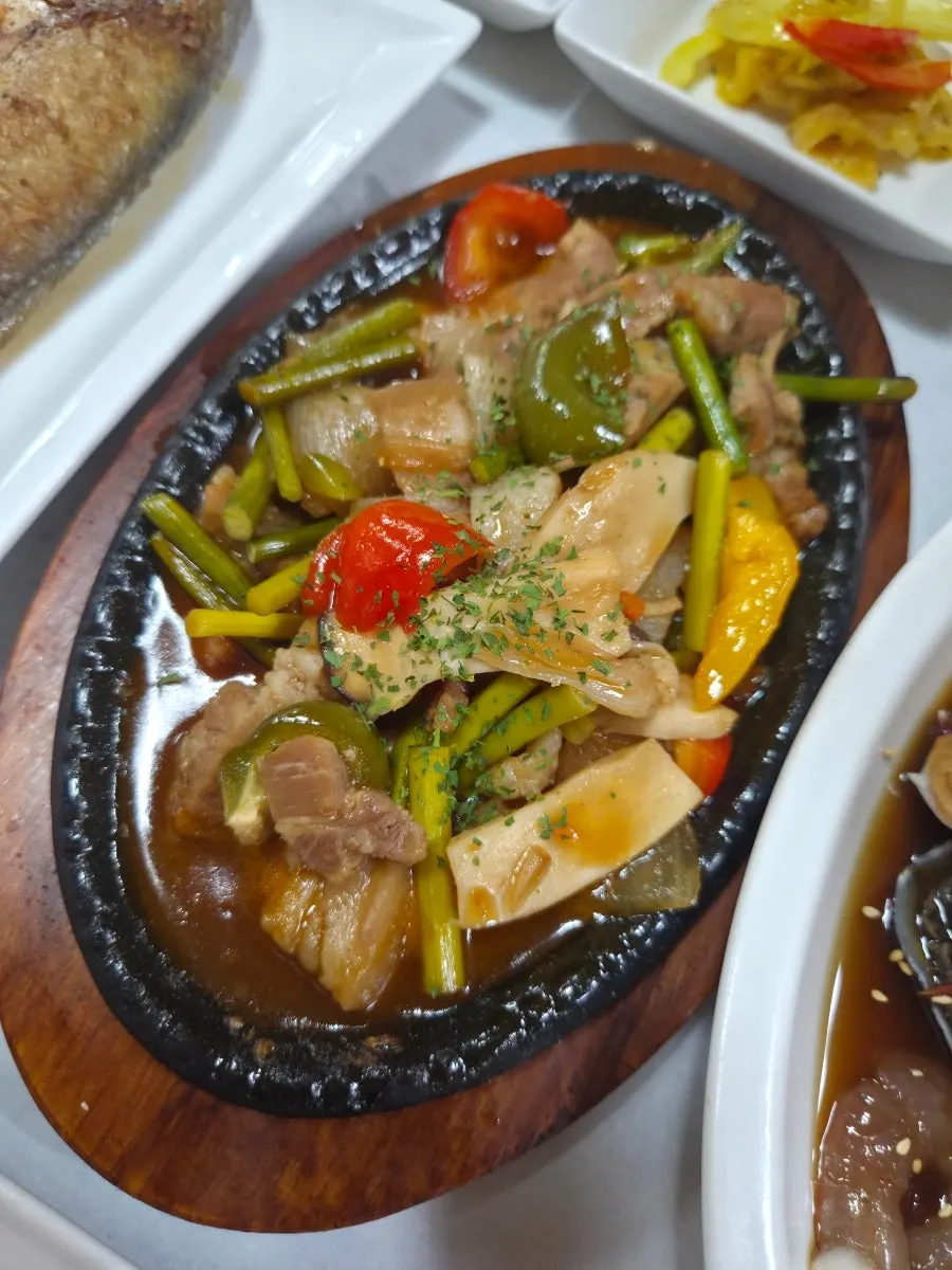 A plate of pork chapsteak