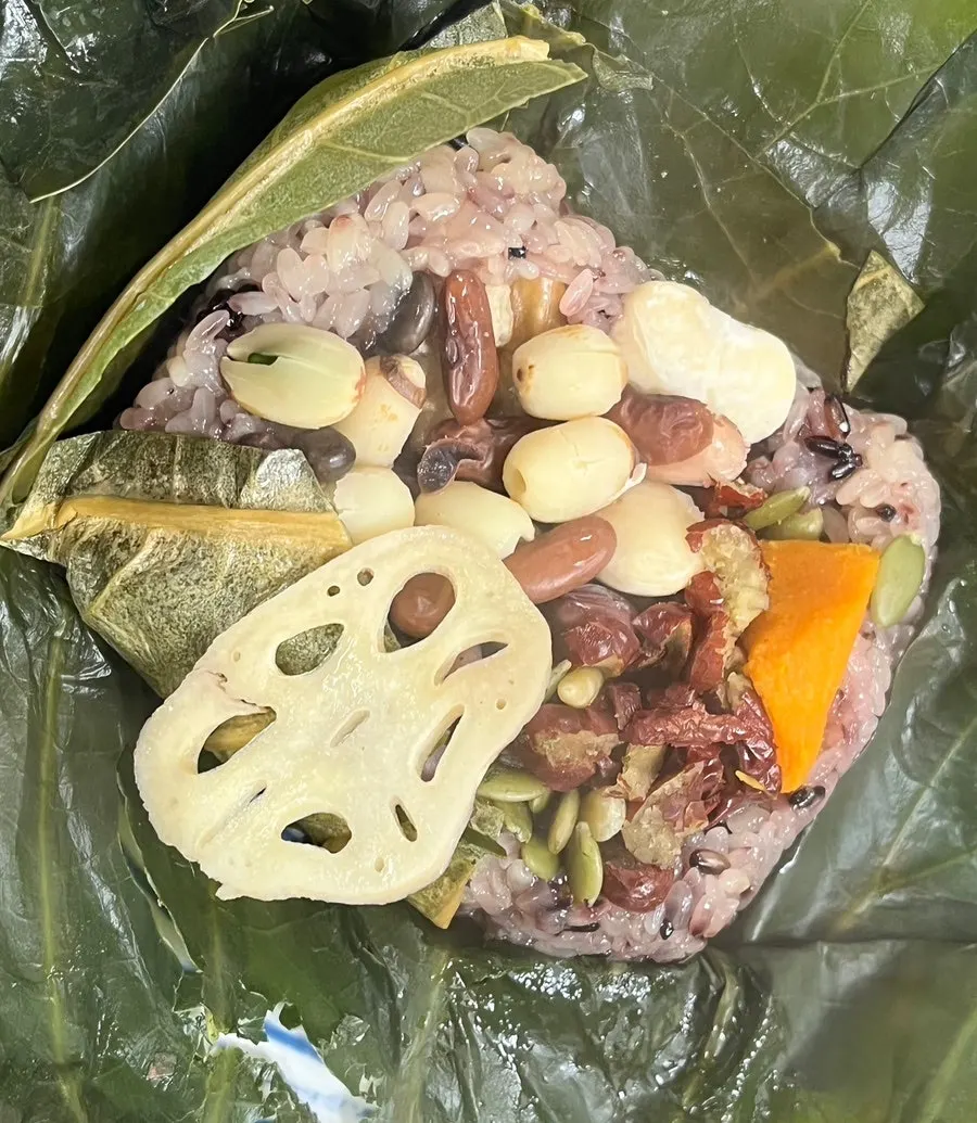 Lotus leaf rice with nuts inside