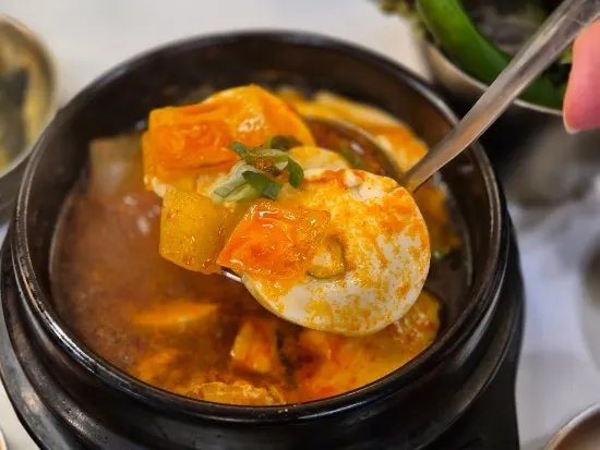 Spicy sundubu jjigae with egg and soft tofu