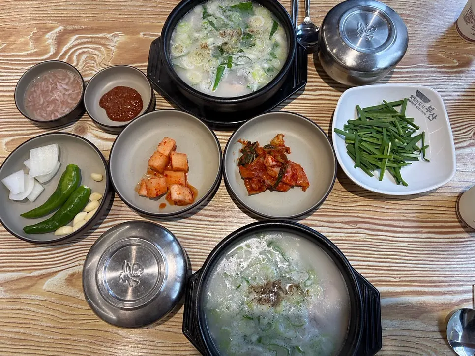 Two bowls of pork soup and blood sausage soup served