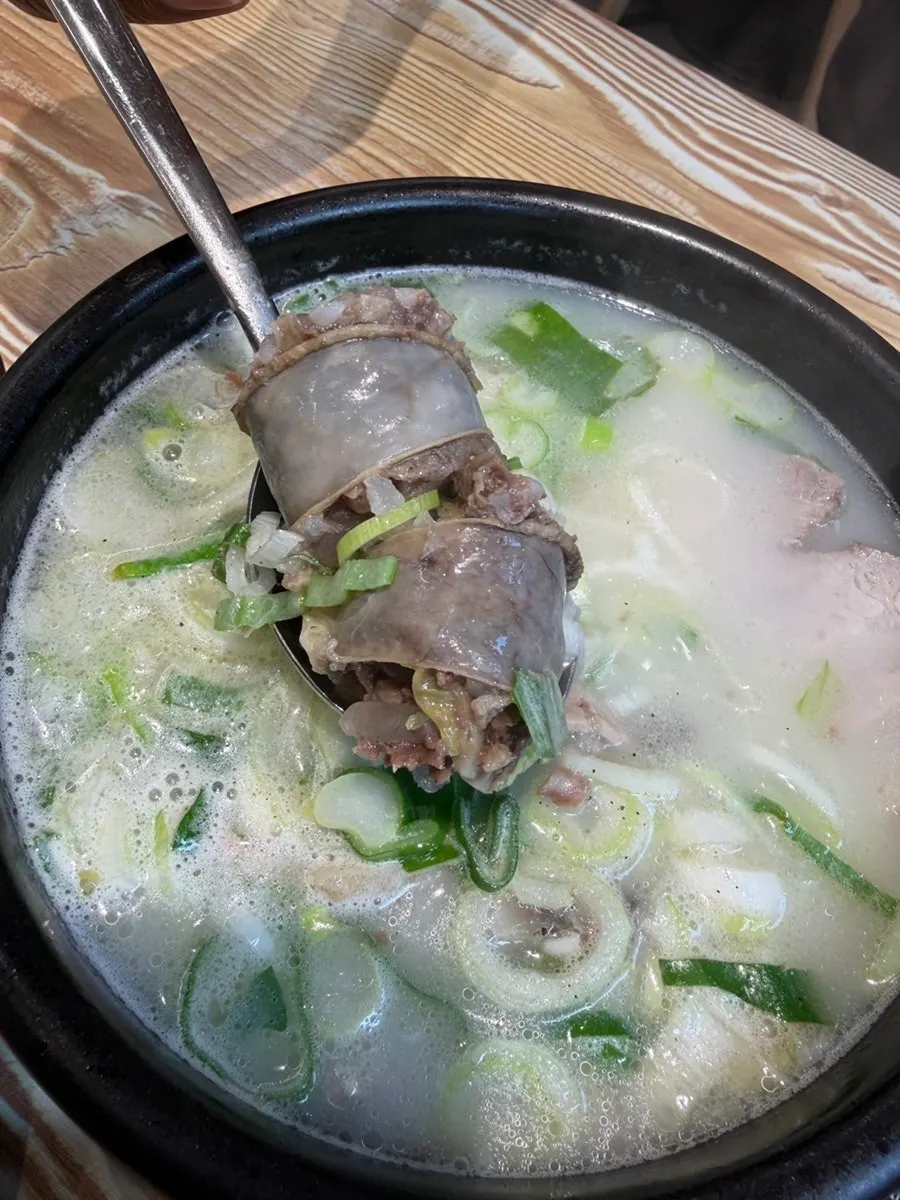 A bowl of pork soup loaded with meat
