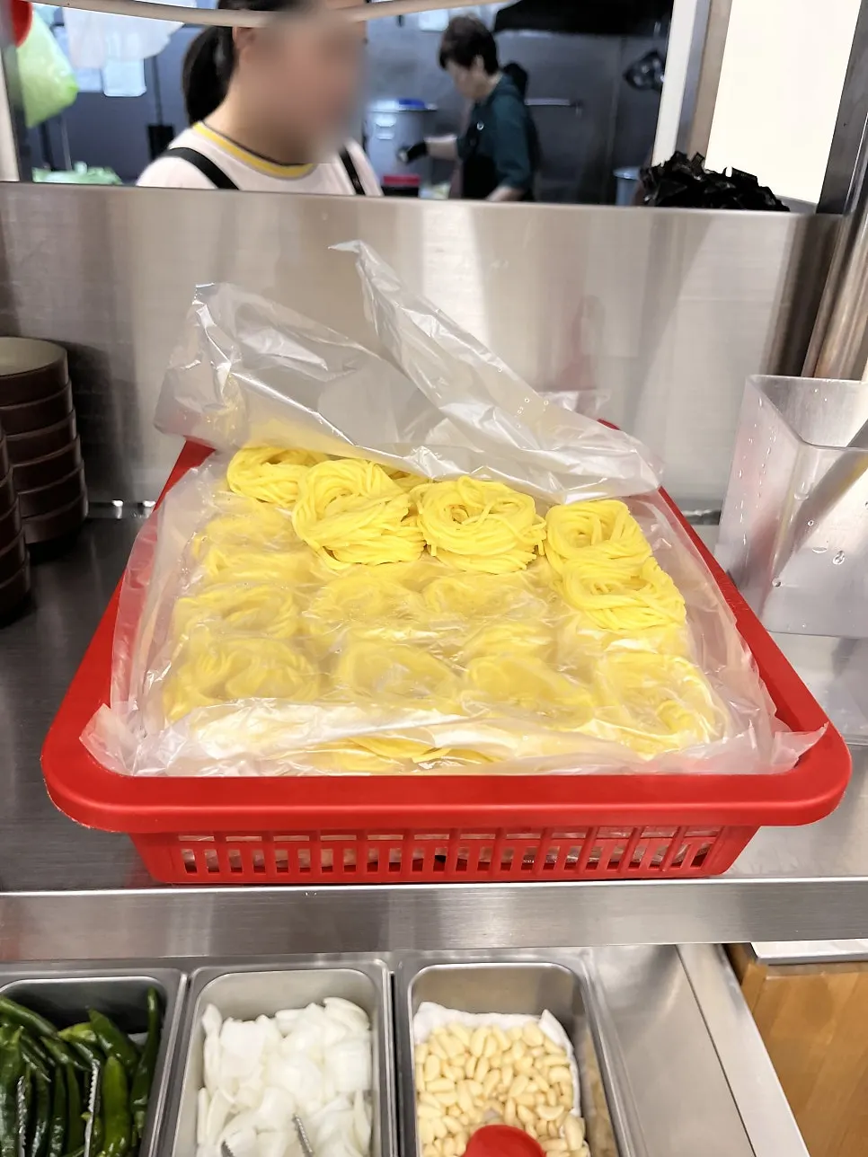 Unlimited refill rice and thin noodles at the self-serve bar