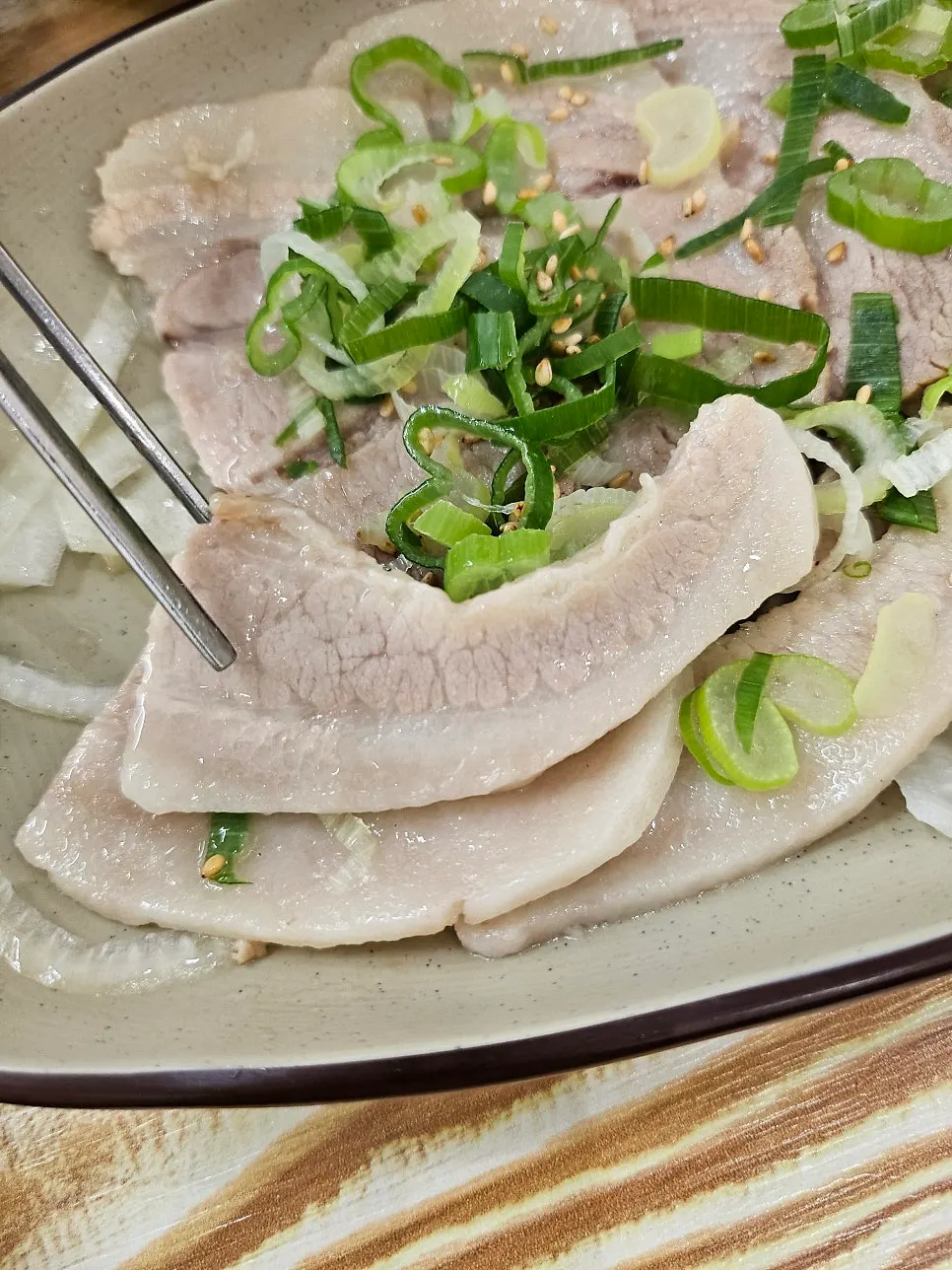 A plate of boiled pork mixing belly and jowl cuts