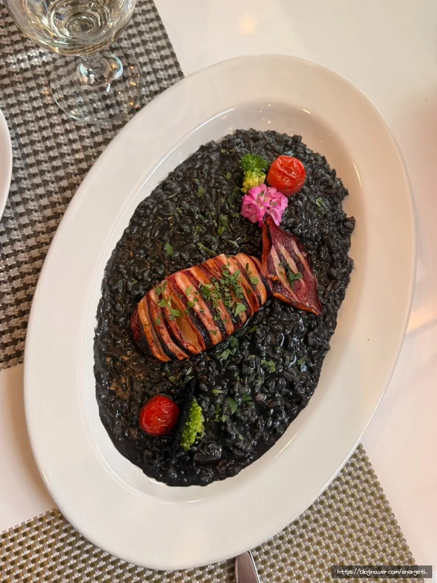 Deep-colored squid ink risotto