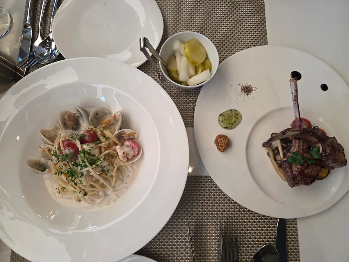 Lamb rib steak plate served with sauce