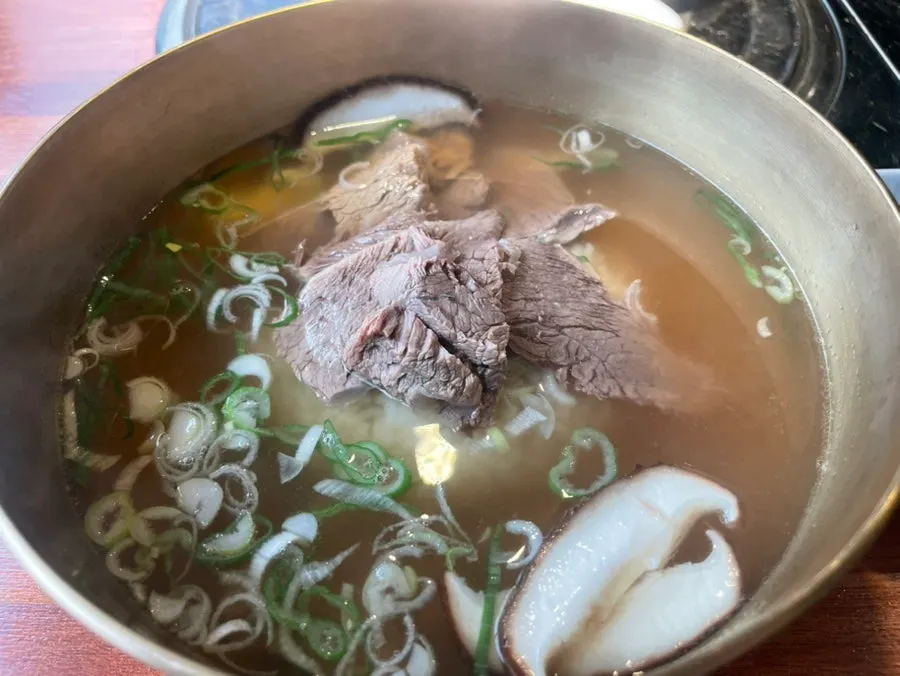 Hanwoo beef piled on top of the broth