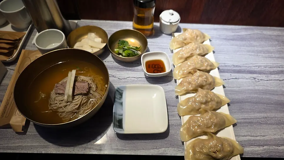Pyeongyang naengmyeon served in a brass bowl