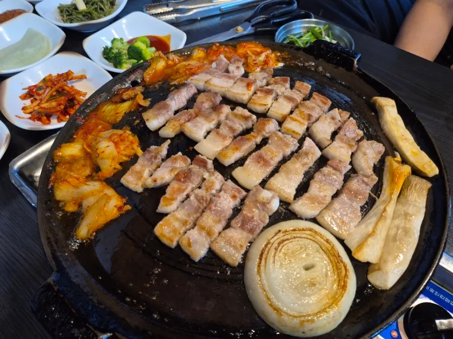 Soju served alongside the pork belly
