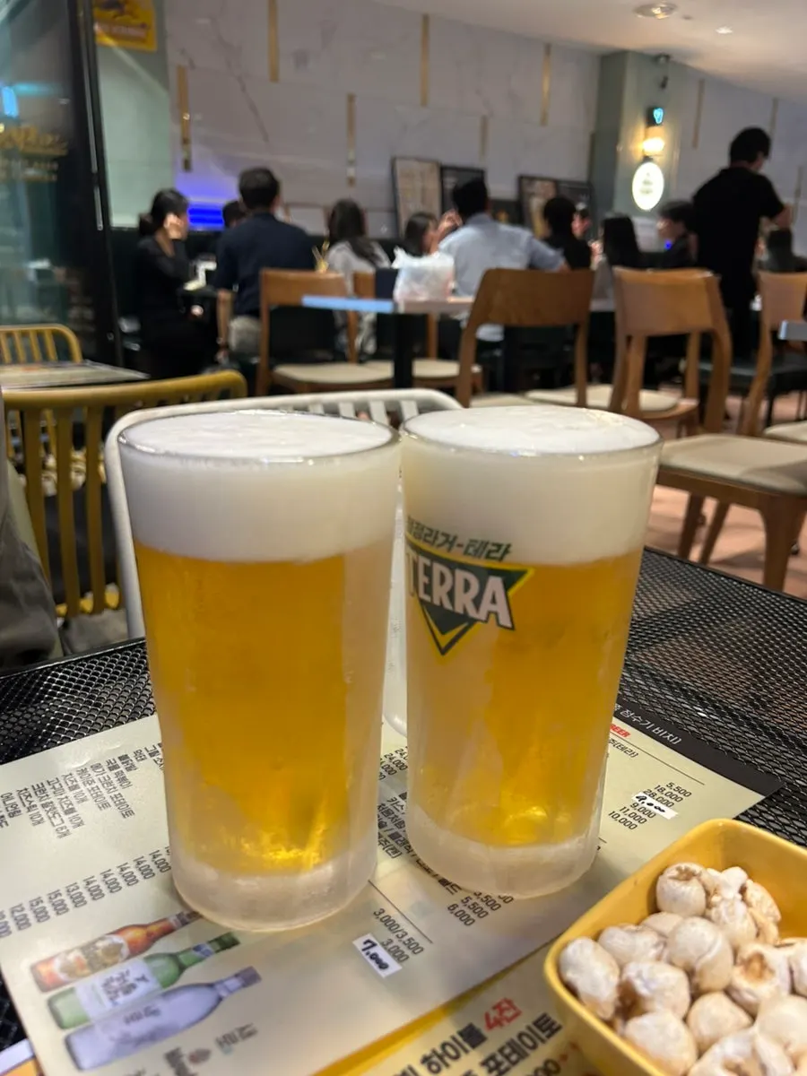 Glass of draft beer with a slushy ice layer