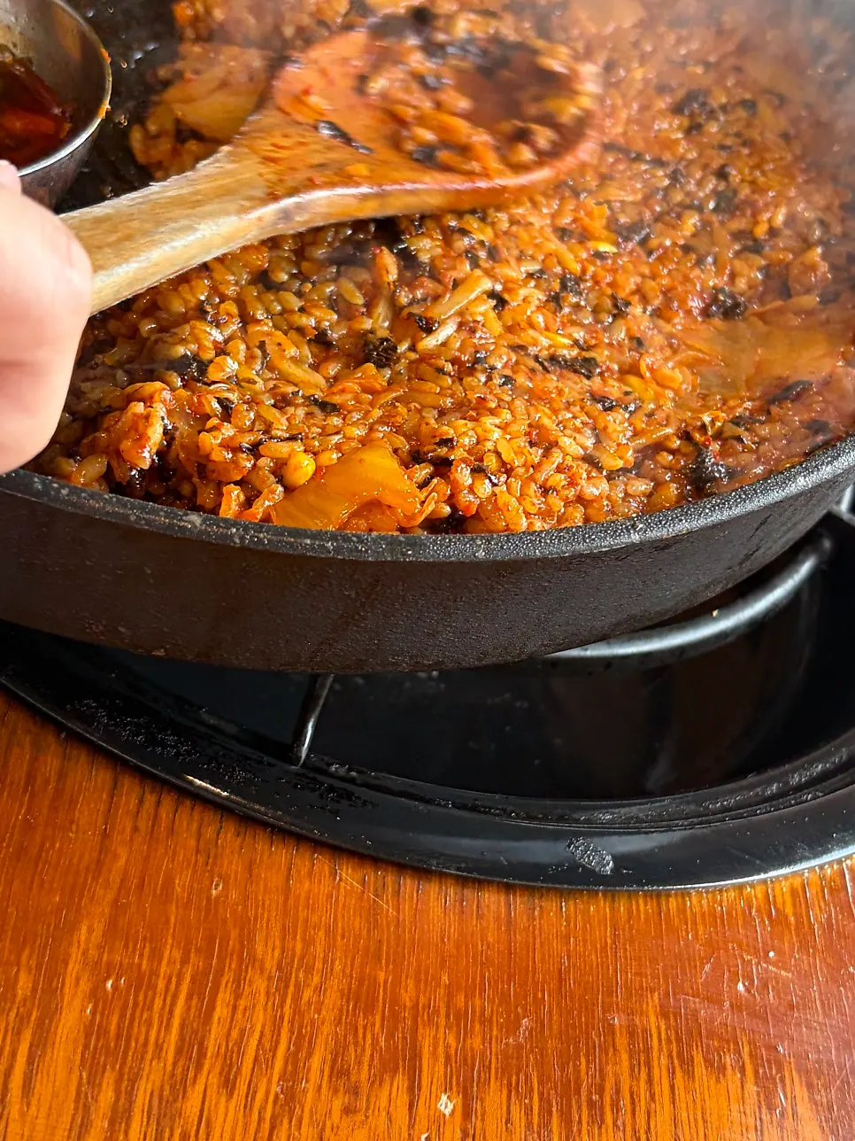 Two servings of fried rice made with meat and vegetables