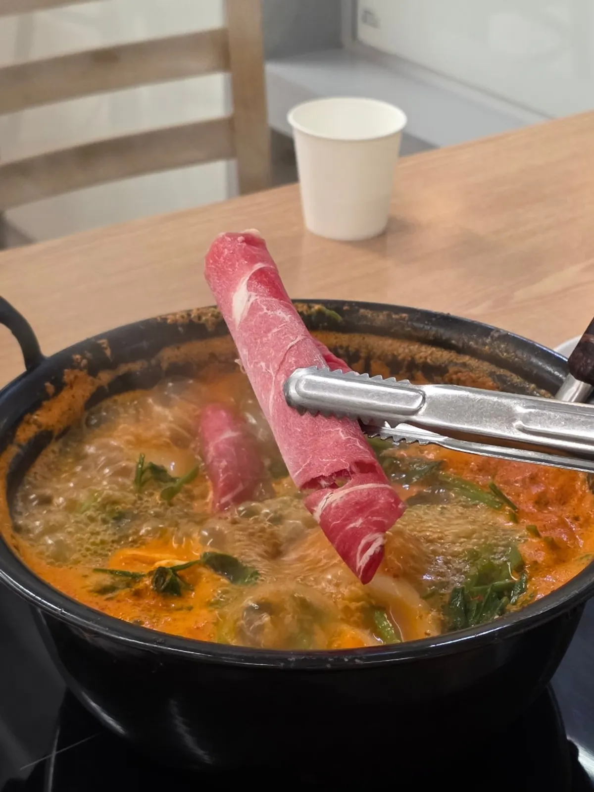 Pot of spicy mushroom kalguksu at Deungchon Shabu Kalguksu Giheung Station Branch