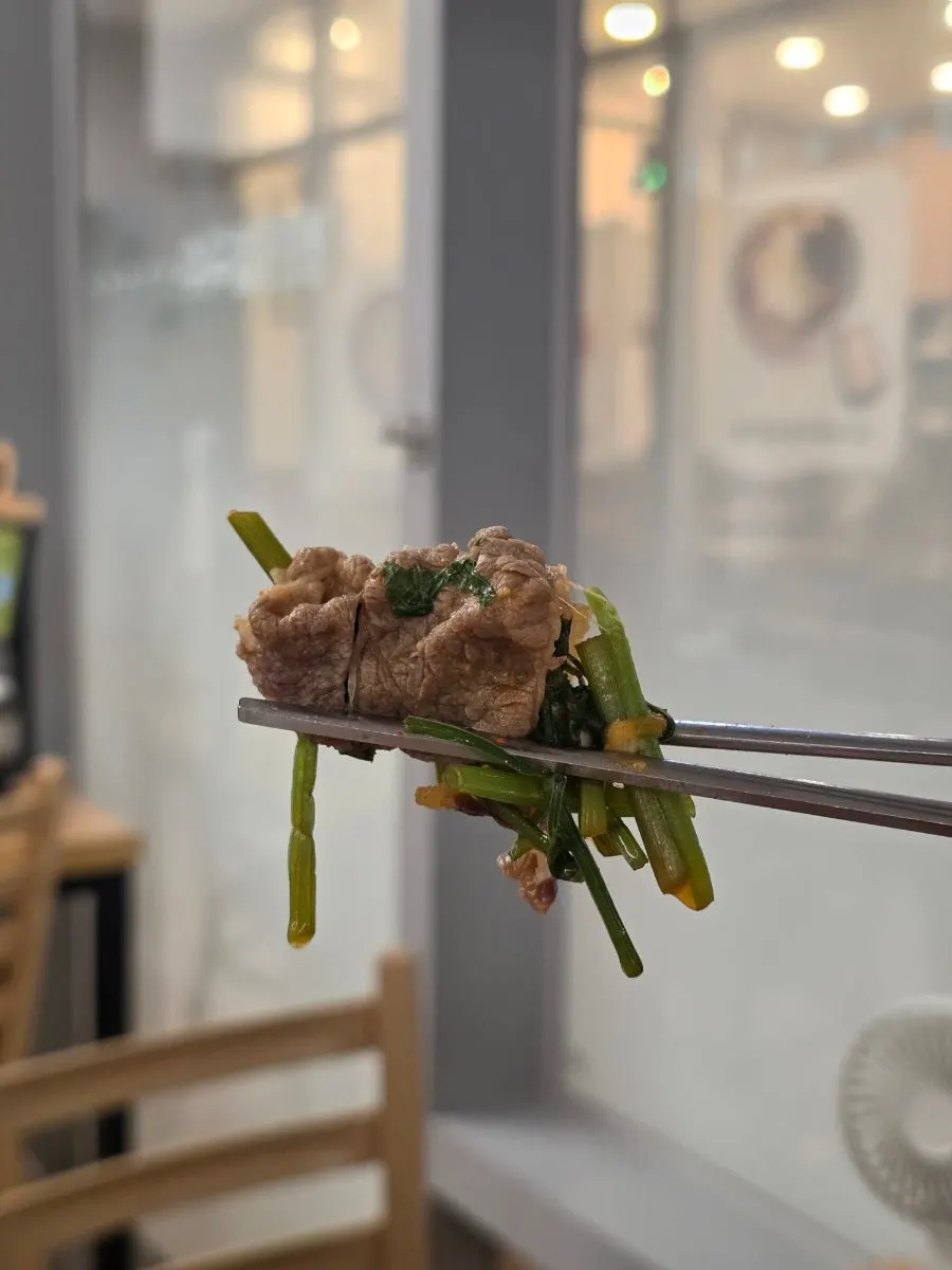 Shabu-shabu beef dipped in soy sauce wasabi sauce