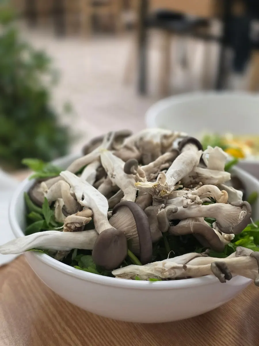 A bite of cooked meat with minari