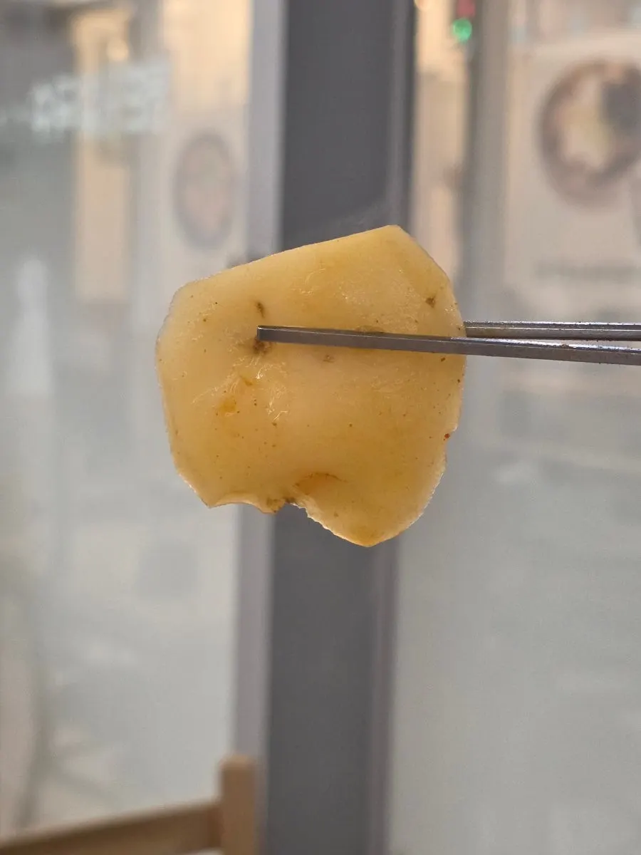 Potato cooked in the spicy broth