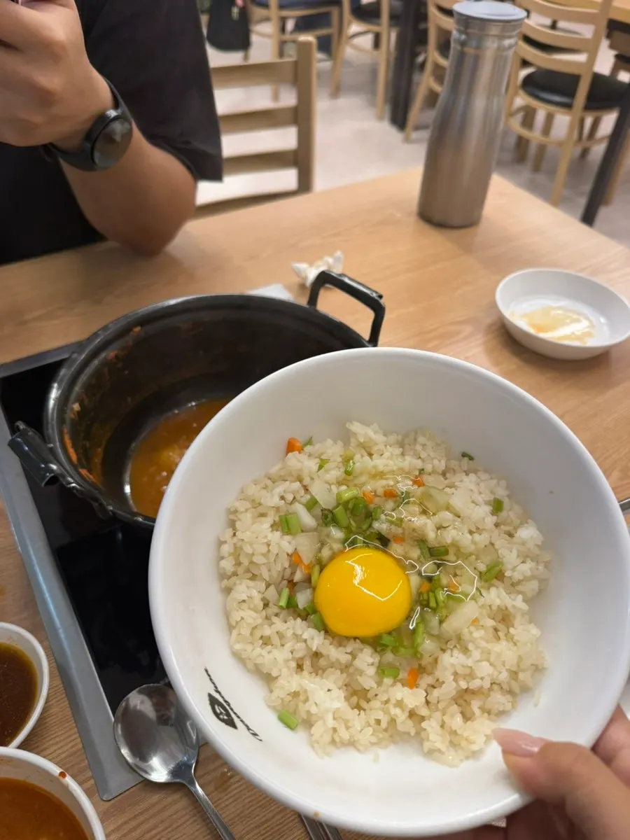 Spicy shabu kalguksu eaten with fresh kimchi