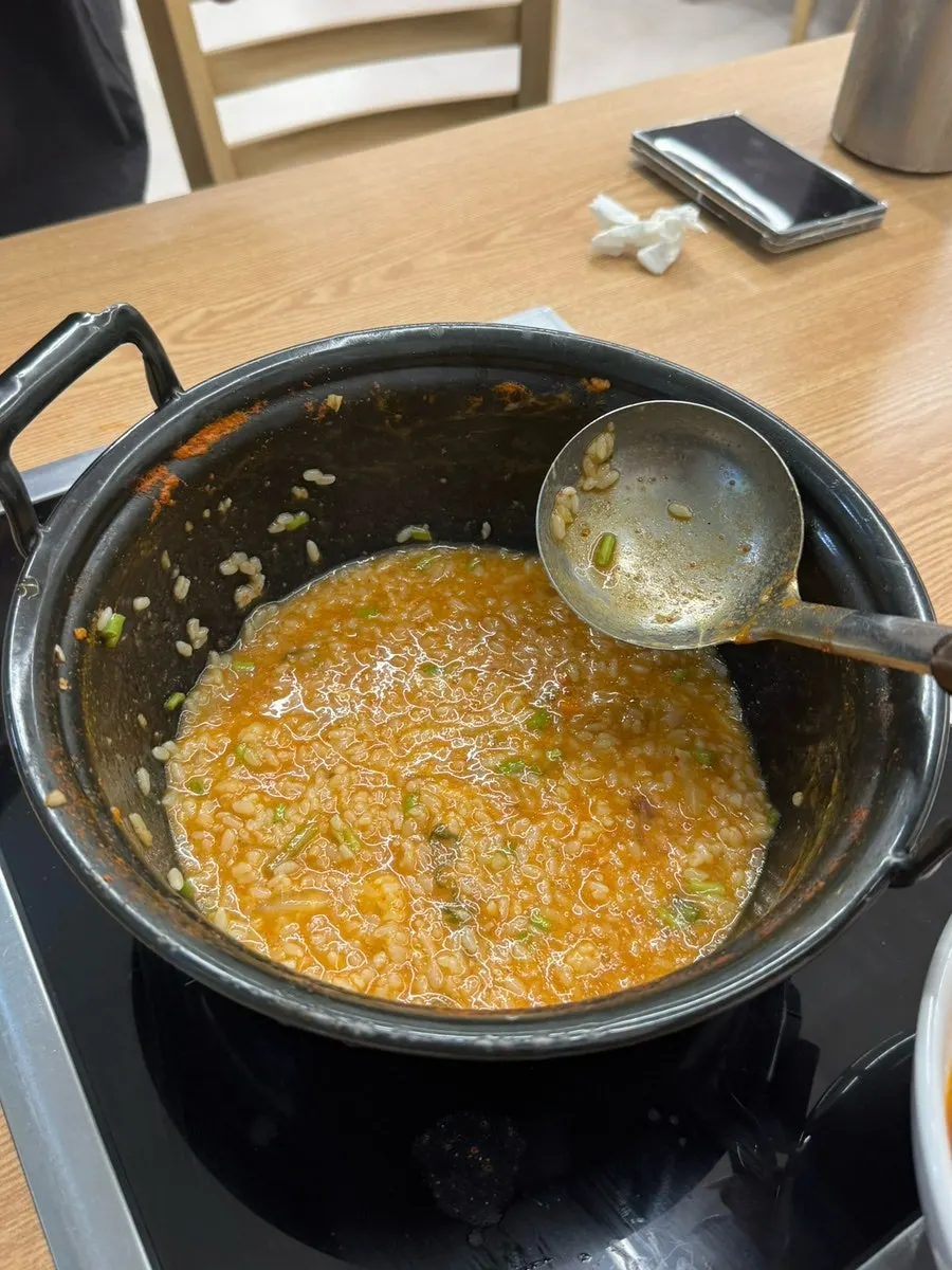 Porridge kit added to remaining broth and simmered