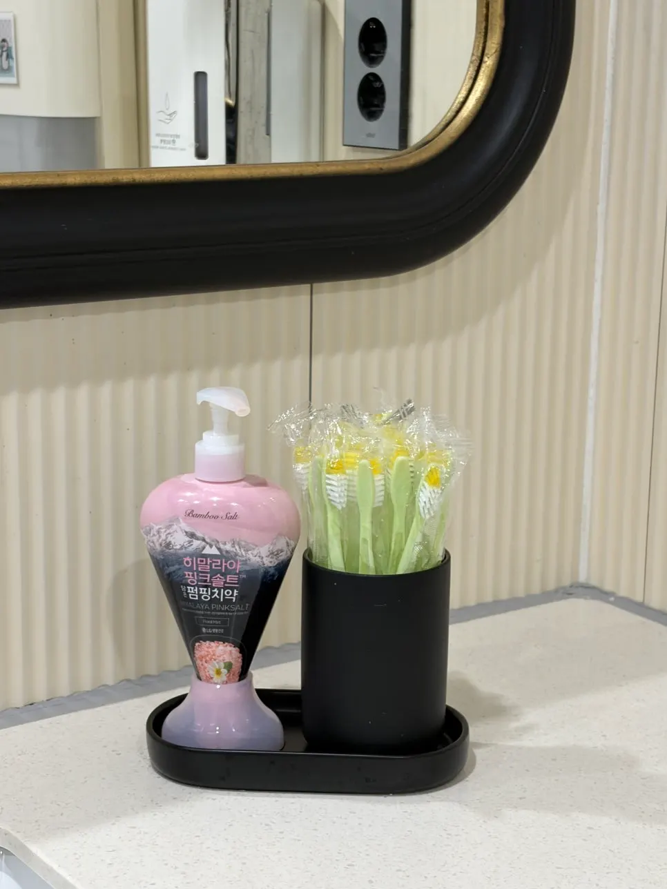 A toothbrush set prepared in the restroom