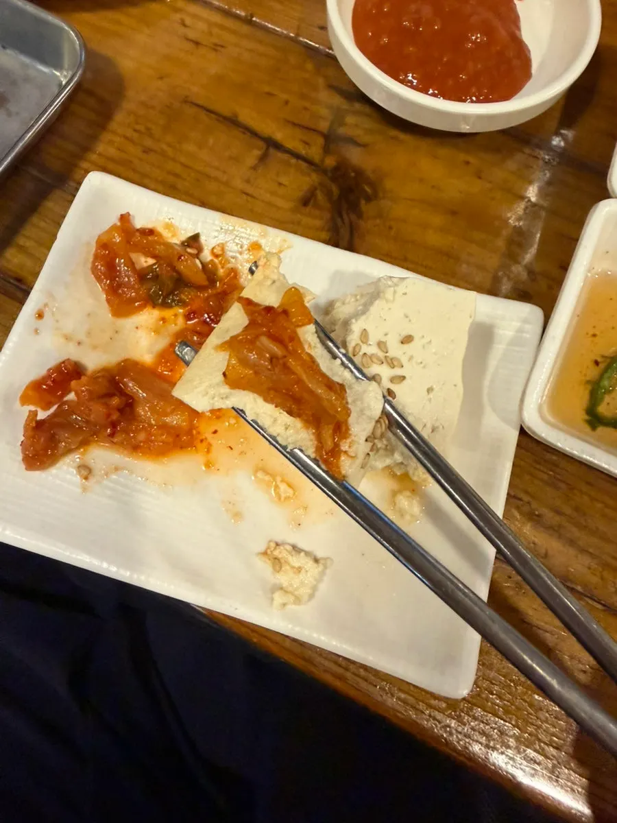 Tofu kimchi served as an appetizer