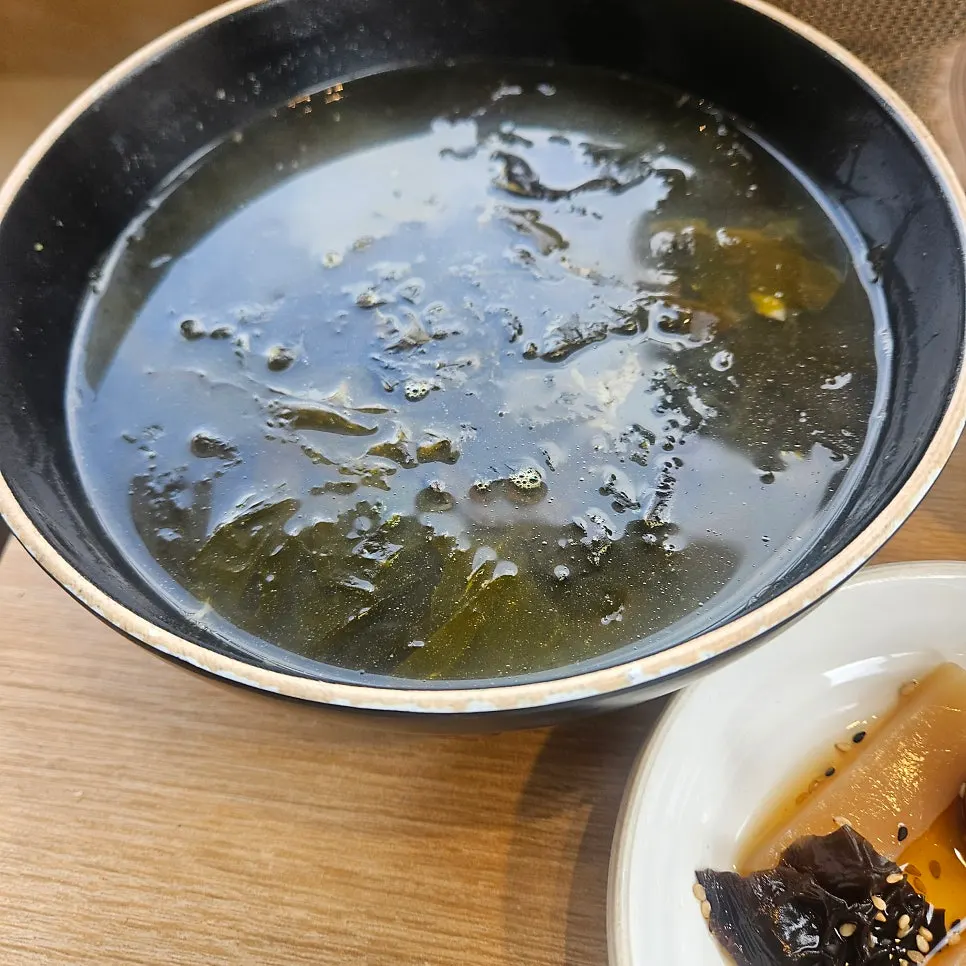 Yukjeon enjoyed with cockle bibimbap