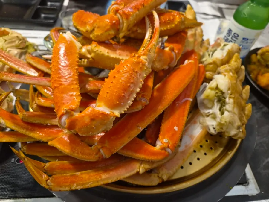 Picking and eating snow crab meat