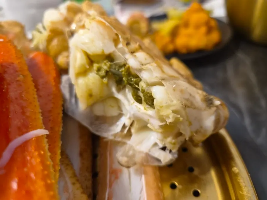 Eating tender snow crab meat