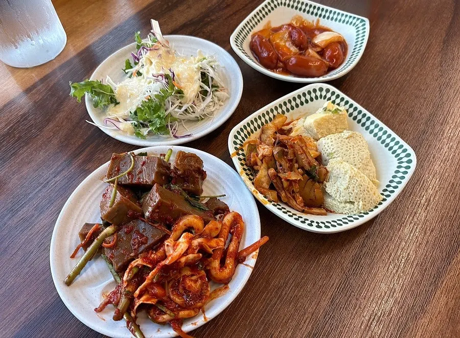 Plate of side dishes picked from the self-serve bar