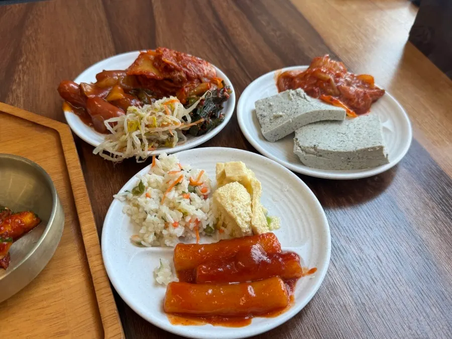 A refilled plate of varied banchan
