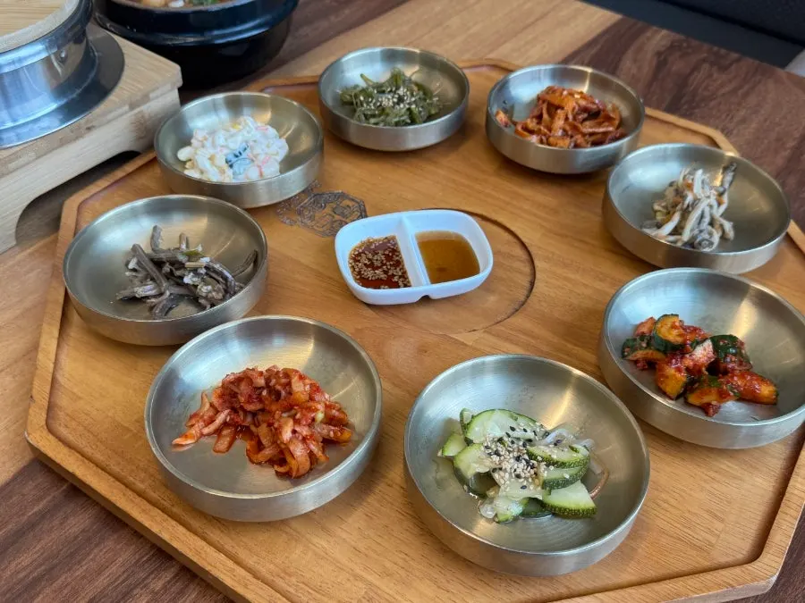 Full table setup of Dongam Tteokgalbi's basic meal